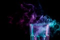 A glass with colorful smoke Royalty Free Stock Photo