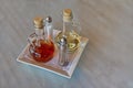 Glass condiment set with olive oil, vinegar, salt and pepper on kitchen table Royalty Free Stock Photo