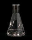 Glass Conical Lab Flask with Liquid Isolated on Black Background.