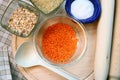 Glass container with lentils . Kitchen utensils. Lentils, oatmeal, rice and sugar