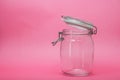 Glass Container On Pink Background