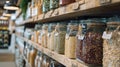 Glass containers filled with colorful legumes beautifully displayed at a market, offering variety and healthful options