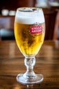 Glass containing stella artois pilsen style draft beer Royalty Free Stock Photo