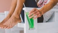 A glass of cool soda in men`s hands close-up. Chill concept Royalty Free Stock Photo