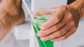 A glass of cool soda in men`s hands close-up. Chill concept Royalty Free Stock Photo