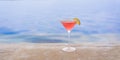 Glass with Cosmopolitan cocktail on the edge of the pool in a resort hotel Royalty Free Stock Photo