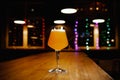 Glass of craft beer on a table in pub Royalty Free Stock Photo