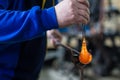 Glass crafting worker make glass souvenir Royalty Free Stock Photo