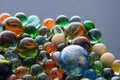 Glass, crystal marbles on grey Royalty Free Stock Photo