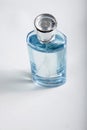 Glass crystal perfume bottle on an isolated white background