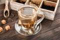 Glass cup of aromatic green tea on wooden table Royalty Free Stock Photo