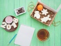 Glass cup of black tea, chocolate and gingerbread gingerbread on a mint-colored table Royalty Free Stock Photo