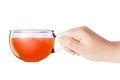 Glass Cup of Black Tea in Hand isolated. 3d Rendering Royalty Free Stock Photo