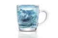 glass cup with a blue ice Royalty Free Stock Photo