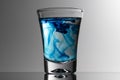 Glass cup for blue tequila Royalty Free Stock Photo