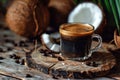 a glass cup of coffee with a coconut and coffee beans Royalty Free Stock Photo