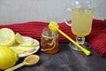 A glass cup of green natural tea with ginger, lemon, mint and honey on wooden rustic background. Healthy drink. Royalty Free Stock Photo