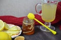 A glass cup of green natural tea with ginger, lemon, mint and honey on wooden rustic background. Healthy drink. Royalty Free Stock Photo