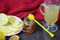 A glass cup of green natural tea with ginger, lemon, mint and honey on wooden rustic background. Healthy drink. Royalty Free Stock Photo