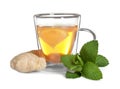 Glass cup with hot ginger tea, mint and lemon Royalty Free Stock Photo