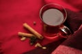 a glass cup of a red warming drink (tea, mulled wine, punch). ingredients for winter hot drinks. beautiful background Royalty Free Stock Photo