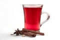 a glass cup of a red warming drink (tea, mulled wine, punch). ingredients for winter hot drinks Royalty Free Stock Photo