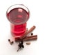 a glass cup of a red warming drink (tea, mulled wine, punch). ingredients for winter hot drinks Royalty Free Stock Photo