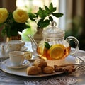 Glass cup of ginger, lemon, and honey tea on table in bright kitchen, cozy homemade beverage Royalty Free Stock Photo