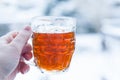 A glass cup of tea in wintertime