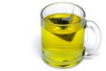 Glass cup with teabag, green tea. Isolated on a white Royalty Free Stock Photo