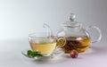 Glass cup and teapot of green tea Royalty Free Stock Photo