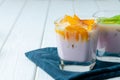 Glass cup with youghurt and fruit slices Royalty Free Stock Photo