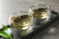 Glass cups of freshly brewed oolong tea on table Royalty Free Stock Photo