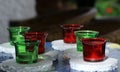 Glass cups with swimming pool candles