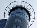 Glass and aluminum cladded office tower roof area detail