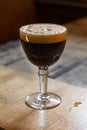 A glass of dark Belgian beer Royalty Free Stock Photo