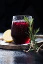 Glass with dark currant or cherry drink Royalty Free Stock Photo