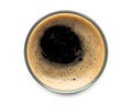 Glass of dark stout beer top view with foam. Isolated on white background. with clipping path