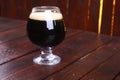 Glass of dark stout