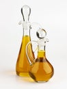 Glass decanter with olive oil on white background Royalty Free Stock Photo