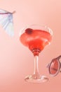 Glass of delicious alcohol drink, strawberry margarita cocktail isolated over pink background. Summer Royalty Free Stock Photo