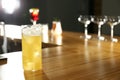 Glass of delicious cocktail with vodka on counter in bar. Space for text Royalty Free Stock Photo