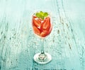 Glass delicious refreshing drink of strawberry and apple with mint, vintage color tone