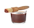 Glass dish of barbecue sauce with basting brush on white Royalty Free Stock Photo