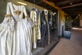 Glass displays of medieval and renaissance clothing and armor inside the oldest public areas of the Prague Czechia Castle Complex