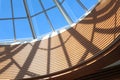 Glass dome constructions shadows in shopping mall in sunny day Royalty Free Stock Photo