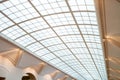 Glass dome or glass roof with white structure in shopping mall