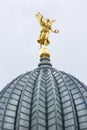 The glass dome with golden statue of Pheme of Dresden Academy of Fine Arts, Dresden, Germany