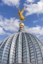 The glass dome with golden statue of Pheme of Dresden Academy of Fine Arts, Dresden, Germany