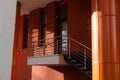 glass door, brown front doors with a nice staircase with black hand railing. Royalty Free Stock Photo